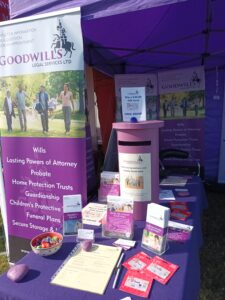 full probate and estate administration services offered by Goodwills Local, an image of a local stand with pamflets and brochures